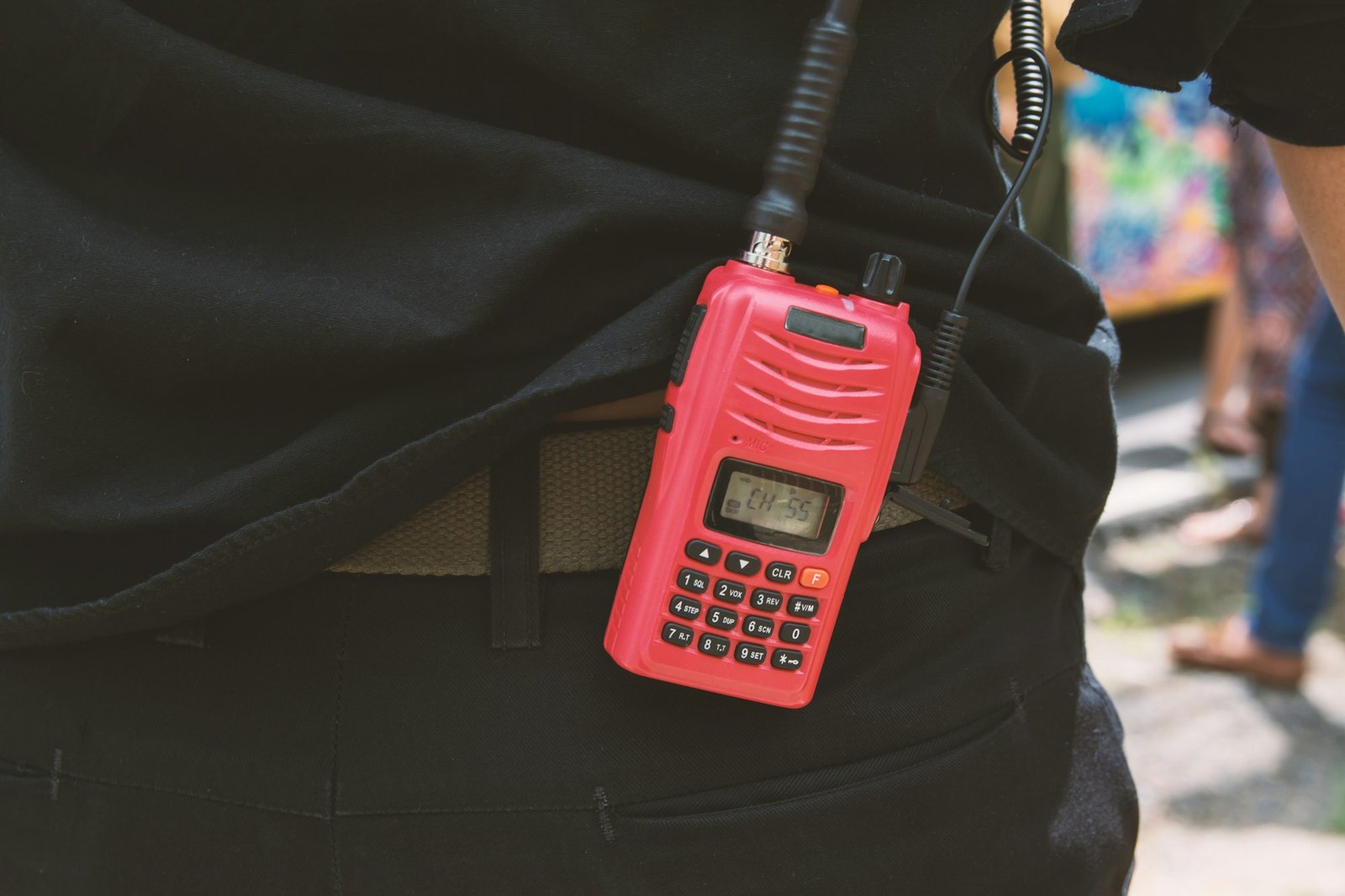 Red radio communication with security guard